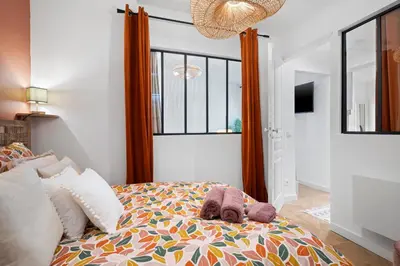 a bedroom with a bed with two stuffed animals on it at Nice Renting - BARBERIS - Unique Getaway 2-Room with Rooftop Terrace in Nice