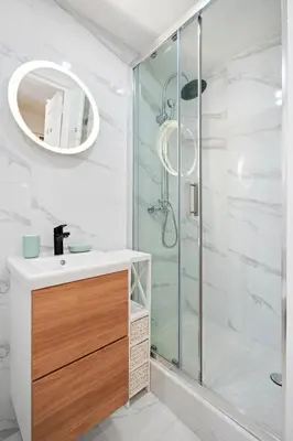 a bathroom with a sink and a shower at Nice Renting - BARBERIS - Unique Getaway 2-Room with Rooftop Terrace in Nice