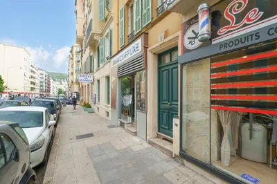 a street with cars parked on the side of a building at Nice Renting - BARBERIS - Unique Getaway 2-Room with Rooftop Terrace in Nice