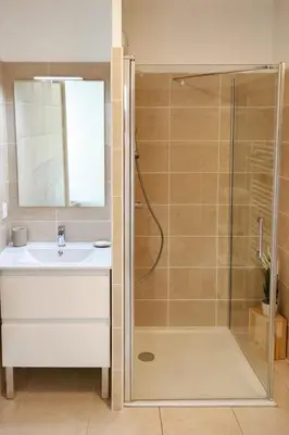 a bathroom with a shower and a sink at Charming 23 m studio near the sea in Nice