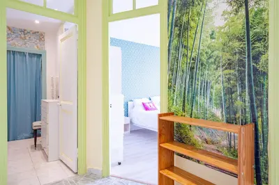 a large aquarium in a room with a bedroom at 2P hyper-centre Nice in Nice