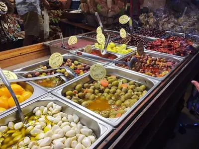 a buffet of different types of fruits and vegetables at Studio cosy près du port in Nice