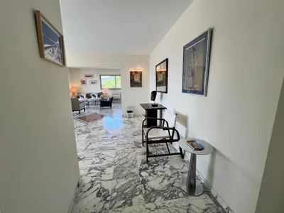 a living room with a marble floor at ApartHotel Riviera - TERRASSE DES AGAVES - Amazing Sea View Nice Côte d'Azur in Nice