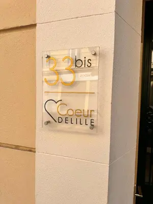 a sign on the side of a building at Studio Coeur Delille FSHH in Nice