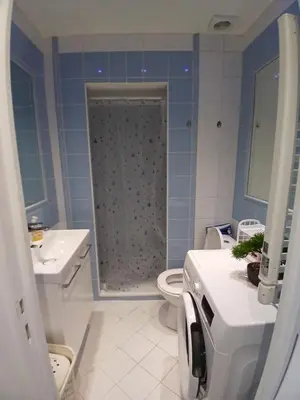 a bathroom with a shower and a toilet and a sink at Maria in Nice