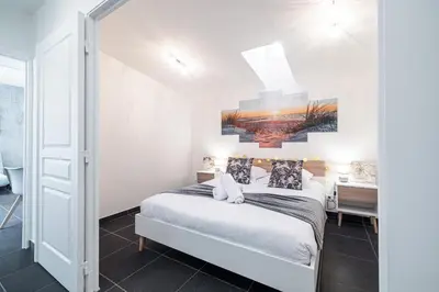 a bedroom with a bed in a room at Large & Quiet 1 Bdr at Nice Port in Nice