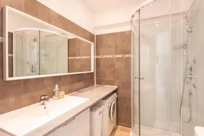 a bathroom with a sink and a shower at #19 Lenval - Balcon Lenval Sea View with AC Promenade des Anglais in Nice