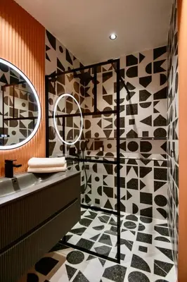 a bathroom with a shower and a sink at Nice Mer & Cours Saleya Serenity Luxury - 2 suites in Nice