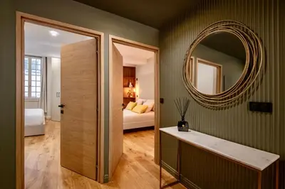 a bathroom with a mirror and a bedroom with a bed at Nice Mer & Cours Saleya Serenity Luxury - 2 suites in Nice