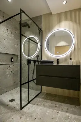 a bathroom with a sink and a mirror at Nice Mer & Cours Saleya Serenity Luxury - 2 suites in Nice