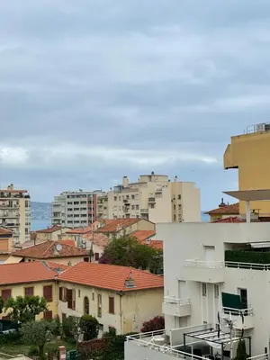 a view of a city with buildings at Cosy flat 250m from beach in Nice