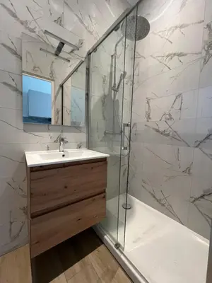 a bathroom with a sink and a shower at Studio Sydney - Jean Médecin - LA RIVIERA LCD in Nice
