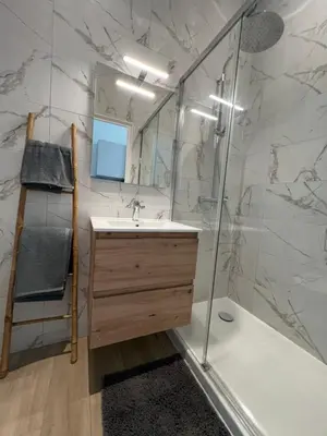 a bathroom with a sink and a shower at Studio Sydney - Jean Médecin - LA RIVIERA LCD in Nice