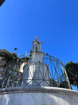 a statue on top of a building with a monument at Chez Yaya in Nice