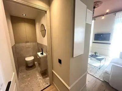 a bathroom with a toilet and a sink at Beaumont republique in Nice