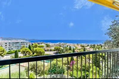 a balcony with a view of the ocean at Magnificent 3 Rooms-Sea View-Terrace-Pool in Nice