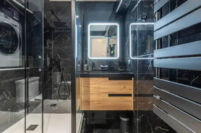 a bathroom with a sink and a shower at Casa feracci in Villefranche-sur-Mer