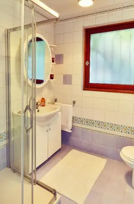 a bathroom with a shower and a sink and a toilet at Best View ever! in Èze