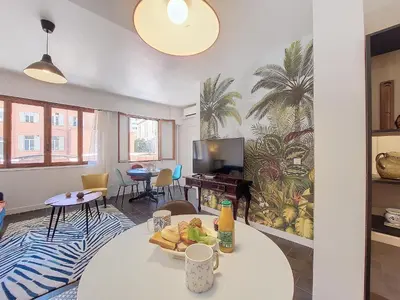 a living room with a table with a bowl of food at Nestor&Jeeves - ESCAPADE - Central - Near Beach in Nice