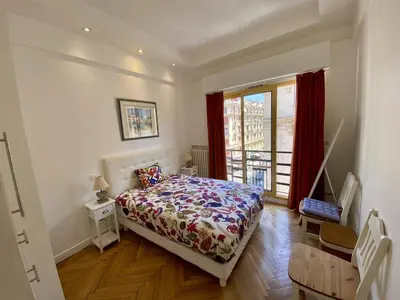 a bedroom with a bed and a window at Nice Hypercentre- Joli 2Pièces in Nice