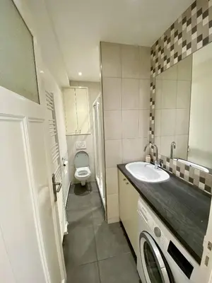 a bathroom with a sink and a toilet at Nice Hypercentre- Joli 2Pièces in Nice
