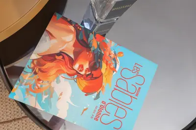 a book sitting on top of a table at Appartement exception les pieds dans l'eau in Èze