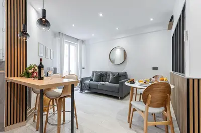 a kitchen and living room with a table and chairs at MY CASA - SMOLETT - Superb Studio Suite Downtown w AC in Nice