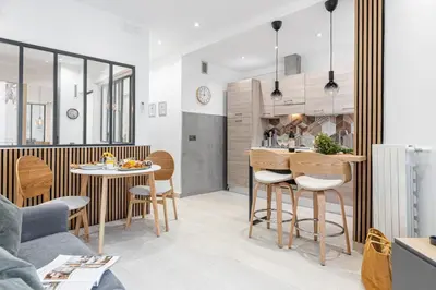 a kitchen and living room with a table and chairs at MY CASA - SMOLETT - Superb Studio Suite Downtown w AC in Nice