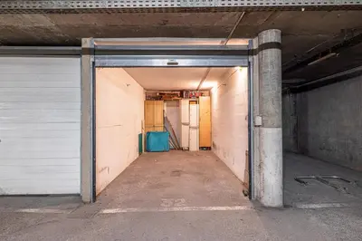 an empty hallway in a building with a garage at Large 2 Bdr Close to the Beach Balcony & Garage in Nice