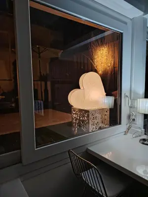 a kitchen with a white refrigerator and a dishwasher at La Terrazza in Nice