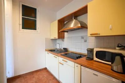 a kitchen with a sink and a microwave at Coeur de Nice - Plage et Centre in Nice