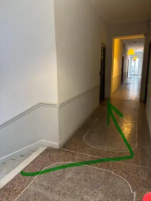 a room with a green arrow on the floor at Coeur de Nice - Plage et Centre in Nice