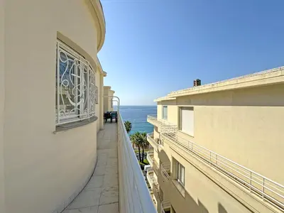 a balcony of a building with a view of the ocean at Sea Front Penthouse Cote d Azur in Nice