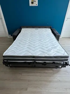 a bed sitting on the floor in a room at Center 2 min walk to beach quiet sunny balcony in Nice