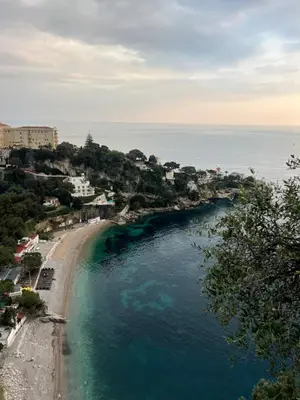 a table and chairs on a balcony with a view of the ocean at Mala Beach Sea View in Cap d'Ail