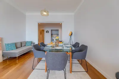 a dining room with a table and chairs at LE 3 PROMENADE AP4424 By Riviera Holiday Homes in Nice