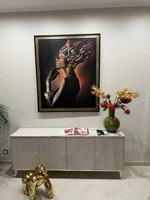 a painting of a woman on a wall at Extraordinaire grand studio au centre 6 minutes à pied de la plage et l'hôtel Negresco in Nice