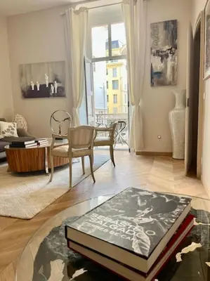 a living room with a couch and a table at Vera Nizza in Nice