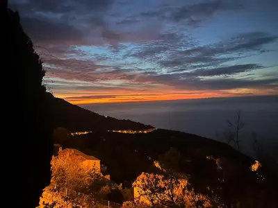 a view of the ocean at sunset from a mountain at Villa Riviera vue panoramique MER et NATURE in Èze