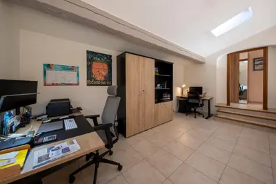 an office with a desk with a computer and a chair at 06C-Villa for 8 persons with pool near Nice in Tourrette-Levens