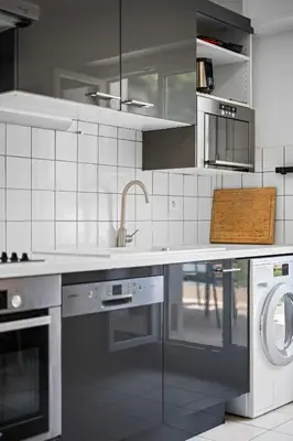 a kitchen with a sink and a washing machine at Ciel d'Orves - Terrasse Spacieuse- Parking privé in Nice