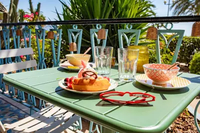 a table with a plate of food with a bunny on it at L54 1BDR Promenade Sea View AC & Balcony in Nice