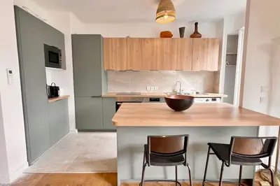 a kitchen with a counter with a bowl on it at Le Villermont - Liberation Centre Ville in Nice