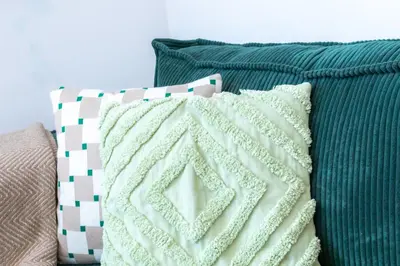 a bed with two pillows and a blanket on it at L52 2BDR Massena central, 2 min from the beach AC in Nice
