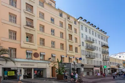 a large building with people walking in front of it at L52 2BDR Massena central, 2 min from the beach AC in Nice