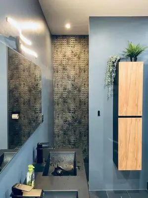 a bathroom with a sink and a mirror at Luxueux appartement, Carré d'Or, Square Mozart in Nice