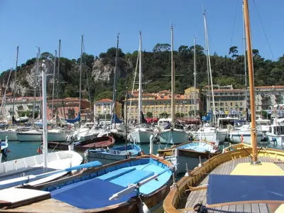a bunch of boats docked in a harbor at Appartement le Fighiéra in Nice