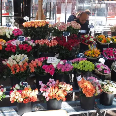 a flower shop with many different types of flowers at Appartement le Fighiéra in Nice
