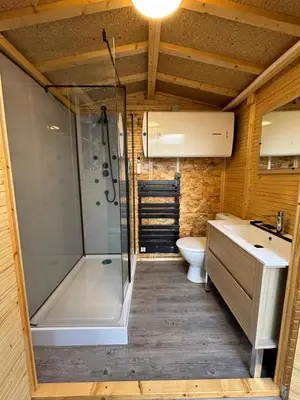 a bedroom with two beds with towels on them at Glamping Dôme in Cagnes-sur-Mer