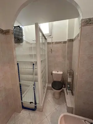 a bathroom with a toilet and a sink at Beau T2 proche Negresco in Nice